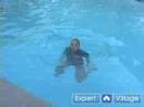 İçin Çocuklara Öğretmek İçin Nasıl Yüzmek : Bir Çocuk Yüzerken Su Basmak Öğretim  Resim 3
