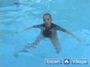 İçin Çocuklara Öğretmek İçin Nasıl Yüzmek : Bir Çocuk Yüzerken Su Basmak Öğretim  Resim 4