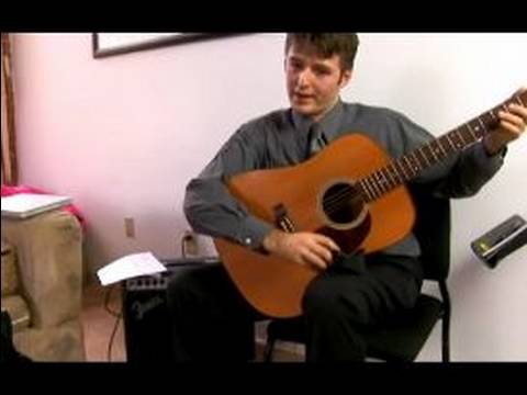 Gitar Dersleri Acemi: Ayarlama, Dizeleri & Notlar : Nasıl Bir Gitar Tutmak İçin 