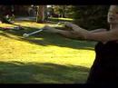 Baton Twirl Nasıl Öğrenin: Bir El-Off İle Yatay Şekil 8 Baton Üzerinde Dönen Resim 3