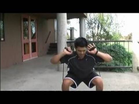 Alt Vücut Egzersizleri Nasıl : Band Squat Alt Vücut Egzersiz Resim 1
