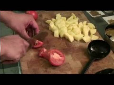 Patatesli Karnabahar Nasıl Pişirilir : Kesilmiş Domates Ve Baharatları Ekle Nasıl  Resim 1