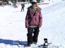 Burun Ve Kuyruk Rulo Snowboarding: Snowboard Yaparken Düz Bir Üs Tutmak